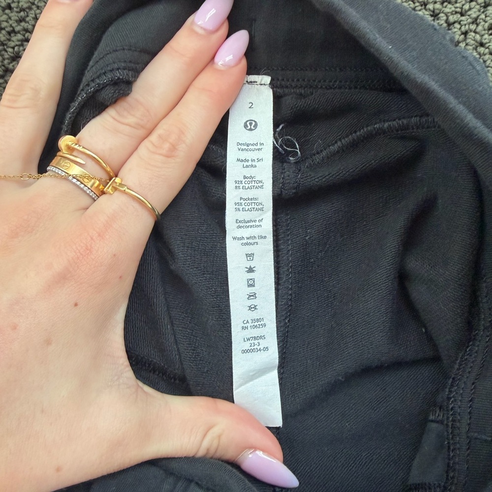 Black lululemon tie up shorts. Super cute! Size 2. - Picture 2 of 3